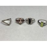 FOUR ASSORTED SILVER RINGS WITH VARIOUS COLOURED STONE EXAMPLES