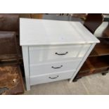 A MODERN WHITE CHEST OF THREE DRAWERS