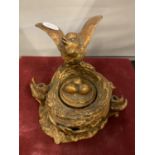 A LATE 19TH CENTURY PAINTED BRONZE INKWELL IN THE FORM OF A BIRD AND BIRD NEST WITH EGGS