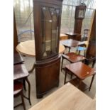 A MAHOGANY CORNER CABINET WITH LOWER DOOR AND UPPER GLAZED PANEL DOOR