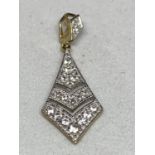 A 9 CARAT GOLD PENDANT MARKED 375 WITH CLEAR STONE CHIPS