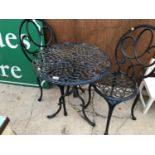 A METAL BISTRO GARDEN SET COMPRISING TWO CHAIRS AND A TABLE