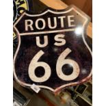 A 'ROUTE 66' METAL SIGN