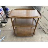 AN ERCOL THREE TIER DINNER TROLLEY, 28x18"