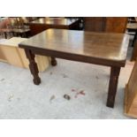 AN OAK REFECTORY STYLE DINING TABLE