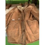 A BROWN SHEEP SKIN COAT