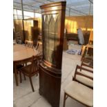 A MAHOGANY CORNER CABINET WITH LOWER DOOR AND UPPER GLAZED DOOR