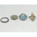FOUR ASSORTED SILVER RINGS TO INCLUDE A CLEAR STONE, TURQOUISE STONE ETC