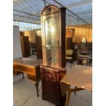 A MAHOGANY CORNER CABINET WITH LOWER DOOR AND UPPER GLAZED DOOR