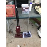 AN ELECTROLUX SUPER BROOM BRUSH UP VAC TOGETHER WITH A BISSELL PERFECT SWEEP TURBO BRUSH