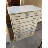 A FRENCH STYLE CREAM CHEST OF SEVEN DRAWERS