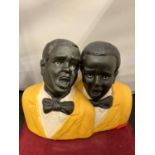 A CERAMIC FIGURE OF TWO MALE JAZZ SINGERS