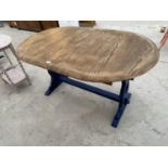 A SHABBY CHIC OAK DINING TABLE ON BLUE SUPPORTS
