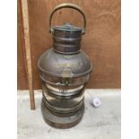 A VINTAGE COPPER AND BRASS MARITIME LAMP WITH MAST HEAD LABEL - CONVERTED TO ELECTRIC