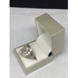 A SILVER WESTERN SADDLE STYLE RING MARKED 925 IN A PRESENTATION BOX