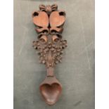 A WOODEN WELSH LOVE SPOON