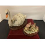 TWO ORNAMENTS ON WOODEN PLINTHS TO INCLUDE A HANDPAINTED SWAN WITH CYGNETS AND BORDER FINE ARTS