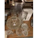 A SELECTTION OF VARIOUS GLASSWARE TO INCLUDE THREE MODERN VASES AND FOUR BOXED CHAMPAGNE FLUTES