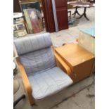 A LOCKABLE WOODEN STORAGE CUPBOARD WITH AN IKEA POANG STYLE CHAIR