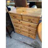 A PINE CHEST OF TWO SHORT AND THREE LONG DRAWERS