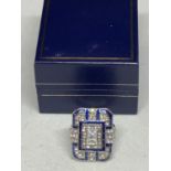 A LARGE RECTANGULAR ART DECO STYLE DRESS RING WITH BLUE AND CLEAR STONES SIZE L WEIGHT 12.7G WITH