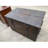 A 19TH CENTURY OAK METAL BOUND TRAVELLING TRUNK BEARING BRASS PLAQUE 'G.C.LEGH ESQ M.P'