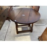 A REPRODUCTION MINIATURE OAK DROP-LEAF TABLE, 23" DIAMETER