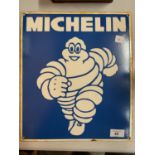 AN ENAMEL 'MICHELIN MAN' SIGN