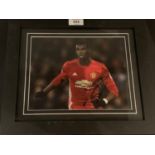 A FRAMED SIGNED PICTURE OF PAUL POGBA COMPLETE WITH CERTIFICATE OF AUTHENTICITY