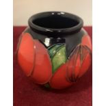 A MOORCROFT RED ROSE VASE TWO INCHES TALL