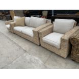 A MODERN WICKER THREE PIECE SUITE