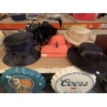 AN ASSORTMENT OF LADIES HATS AND A CLUTCH BAG