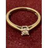 A 9 CARAT GOLD DIAMOND RING