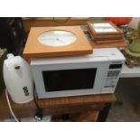 A PANASONIC MICROWAVE, A KETTLE AND A WALL CLOCK ETC