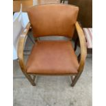 A BENTWOOD OAK CARVER ARMCHAIR WITH STUDDED LEATHER SEAT AND BACK