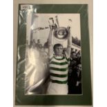 A CARD MOUNTED SIGNED PHOTOGRAPH OF CELTIC FOOTBALLER BILLY MCNEIL
