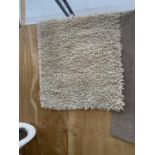 A WOOLEN RUG 53 X 72"