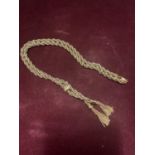 A 9 CARAT GOLD ROPE CHAIN WITH TASSEL DECORATION WEIGHT 19.8 GRAMS WITH PRESENTATION BOX