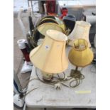 THREE MIXED TABLE LAMPS,BELIEVED IN WORKING ORDER BUT NO WARRANTY WITH TWO FURTHER BRASS DRESSING