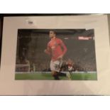 A MASON GREENWOOD MANCHESTER UNITED STAR SIGNED PHOTOGRAPH IN A MOUNT COMPLETE WITH A CERTIFICATE OF