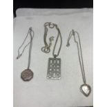 THREE SILVER PENDANTS MARKED TO INCLUDE A HEART LOCKET, A OCTAGONAL LOCKET AND A LATTICE STYLE