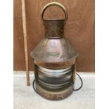 A VINTAGE COPPER AND BRASS MARITIME LAMP WITH PORT LABEL AND MAKERS LABEL, A BROWNLEE & CO,