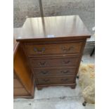 A REPRODUCTION MAHOGANY AND CROSSBANDED CHEST OF FOUR DRAWERS, 17.5" WIDE
