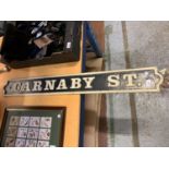 A HEAVY CAST METAL 'CARNABY STREET' STREET SIGN