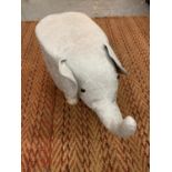 A FAUX SUEDE ELEPHANT FOOT STOOL