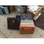 A LARGE QUANTITY OF RECORDS TO INCLUDE STORAGE CASES