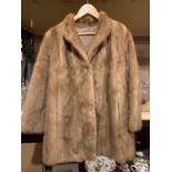 AN INITIALLED L.R LADIES FUR JACKET