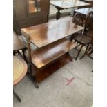 A THREE TIER FOLDING MAHOGANY SERVING TABLE (LOWER SHELF UNATTACHED)