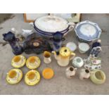 AN ASSORTMENT OF CERAMIC WARE TO INCLUDE CUPS AND SAUCERS AND TUREENS ETC