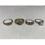 FOUR ASSORTED SILVER RINGS